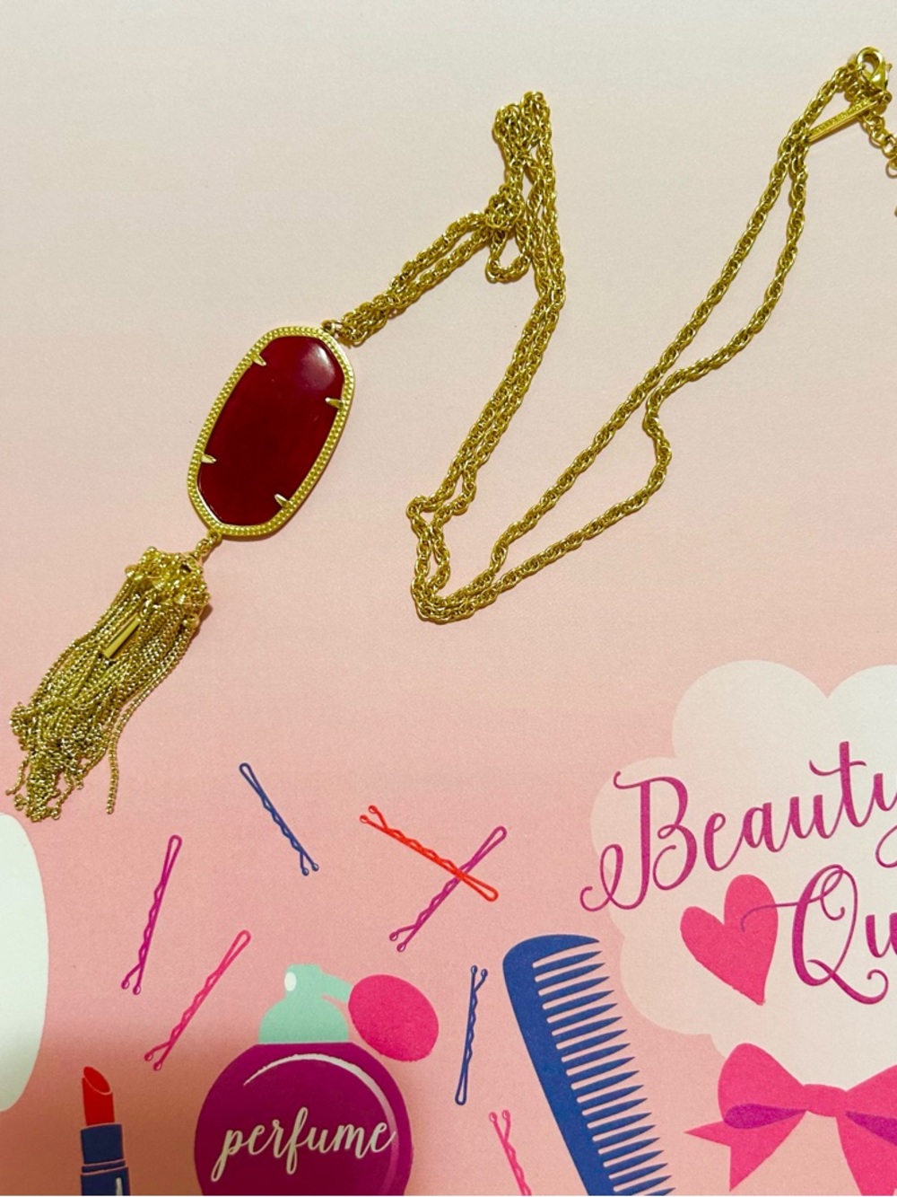 Kendra Scott Gold-Tone Necklace with Burgundy Oval Pendant and Tassel